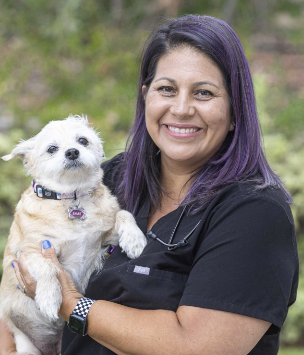 Woman holding a dog